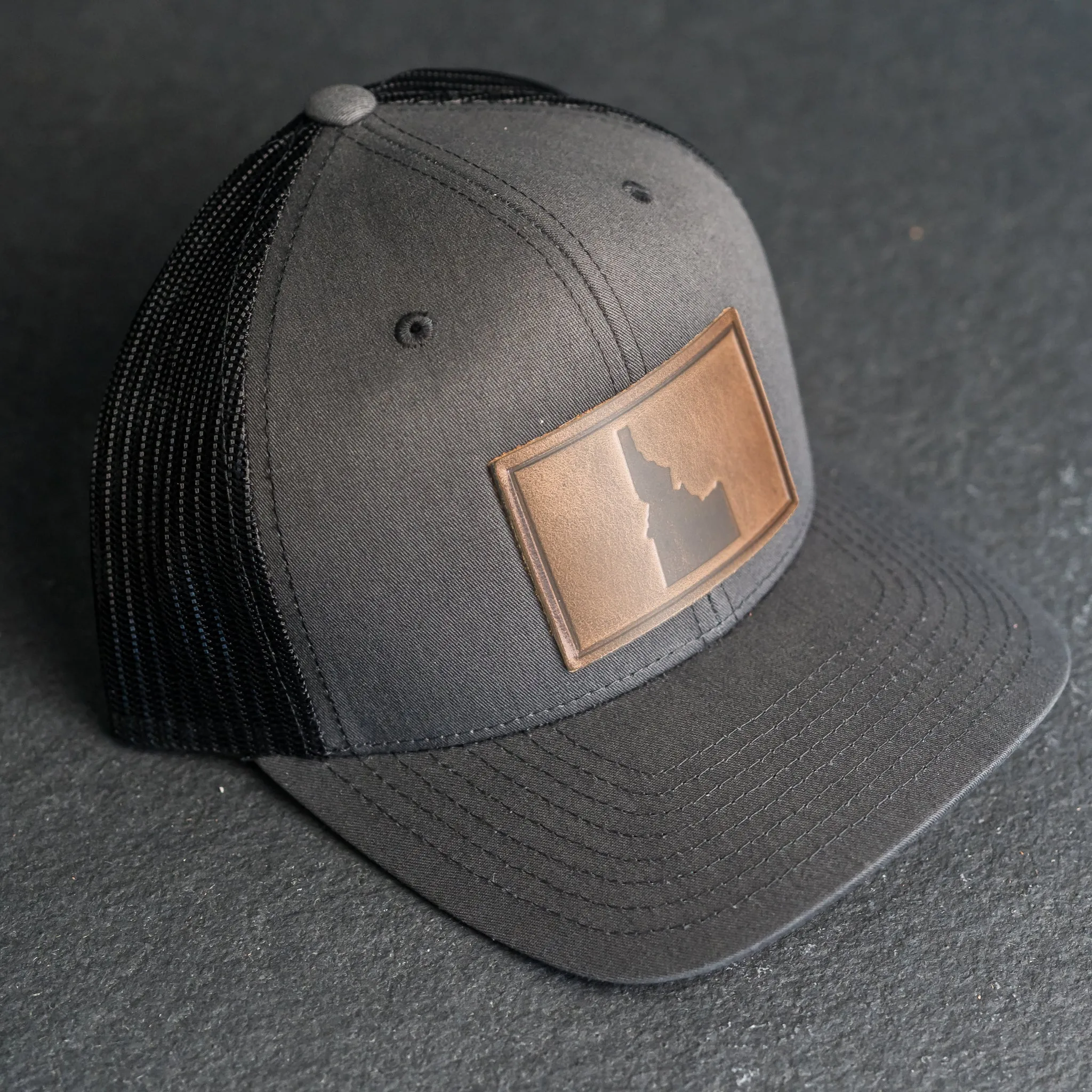 Leather Patch Trucker Style Hat - Idaho Stamp