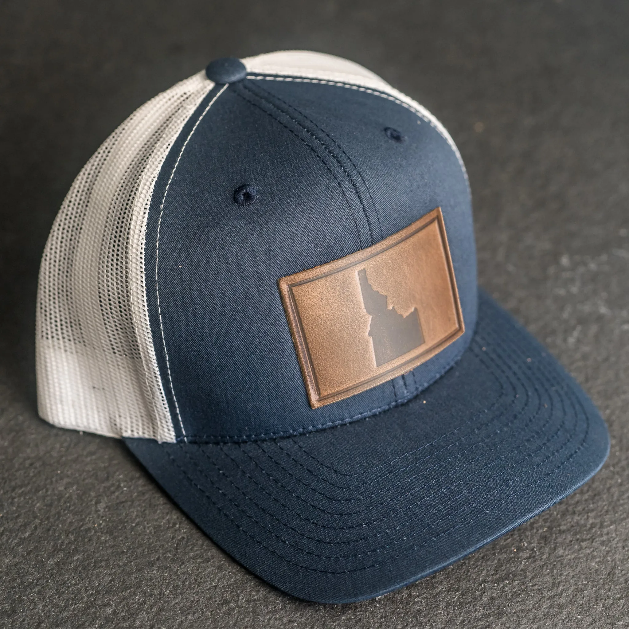Leather Patch Trucker Style Hat - Idaho Stamp